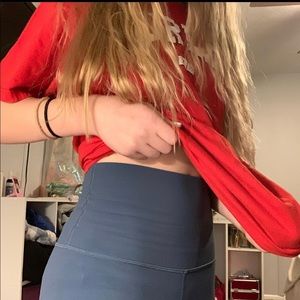 a red Hurley t-shirt.